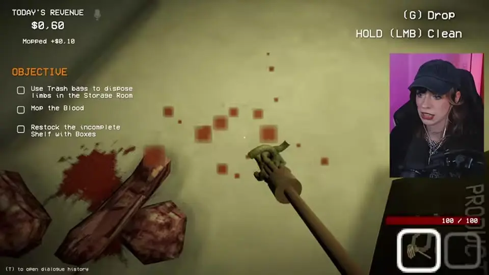 The mop held over a blood patch while the opening cleanup is still active